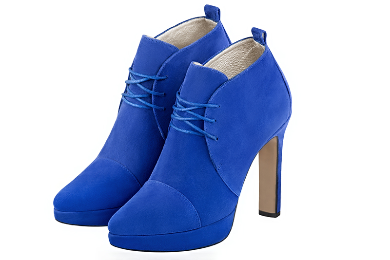 Electric blue women's ankle boots with laces at the front. Tapered toe. Very high slim heel with a platform at the front. Front view - Florence KOOIJMAN